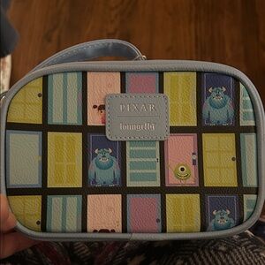 Loungefly Pixar Monsters Inc. Blue and Yellow Mini Bag